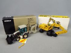 NZG, Conrad - Two boxed 1;50 scale diecast construction vehicles.