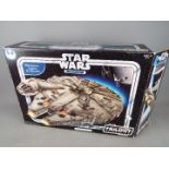 Star Wars - a Hasbro Star Wars Millennium Falcon with electric lights and sounds from the Original