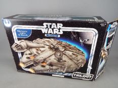 Star Wars - a Hasbro Star Wars Millennium Falcon with electric lights and sounds from the Original