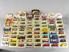 Lledo - A boxed collection of 74 diecast vehicles by Lledo.