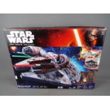 Star Wars - a Star Wars The Force Awakens Millennium Falcon by Hasbro with Nerf Guns model No.