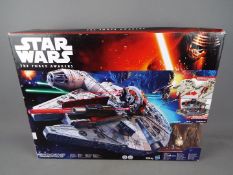 Star Wars - a Star Wars The Force Awakens Millennium Falcon by Hasbro with Nerf Guns model No.