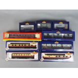 Bachmann, Hornby - Nine boxed OO gauge items of passenger and freight rolling stock.