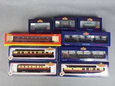 Bachmann, Hornby - Nine boxed OO gauge items of passenger and freight rolling stock.