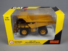 Norscot - A boxed 1:50 scale diecast Norscot #55147 Caterpillar 772 Off-Highway Truck.