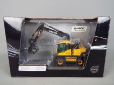 NZG - A boxed diecast 1:50 scale NZG #814 'Collectors Edition' Volvo EW160C Wheeled Material