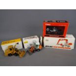 NZG,Conrad, BYMO - Four boxed diecast construction vehicles in 1:50 scale.