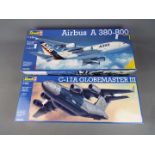 Revell - two all plastic model kits by Revell to include a C-17A Grobemaster III, model No.