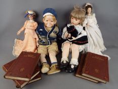 Porcelain Collector Dolls - two large porcelain collector dolls in the form of a girl and a boy,