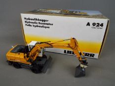 NZG - A boxed diecast 1:50 scale NZG #780 Liebherr A924 Litronic Hydraulic Excavator .