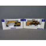 Universal Hobbies - Two boxed diecast 1:50 scale construction vehicles by Universal Hobbies.