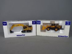 Universal Hobbies - Two boxed diecast 1:50 scale construction vehicles by Universal Hobbies.