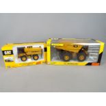 Norscot - Two boxed 1:50 scale diecast construction vehicles by Norscot.