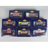 Bachmann - Eight boxed OO gauge items of freight rolling stock.