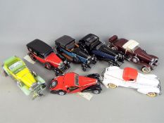 Franklin Mint - seven precision diecast 1:24 scale models comprising 1930 Bugatti Royale Coupe