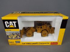 Norscot - A boxed 1:50 scale diecast Norscot #55074 Caterpillar 836G Landfill Compactor.