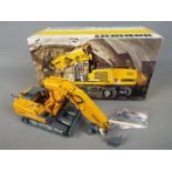 NZG - A boxed diecast 1:50 scale NZG #806 Liebherr R944 Litronic C Tunnel Excavator .