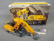 NZG - A boxed diecast 1:50 scale NZG #806 Liebherr R944 Litronic C Tunnel Excavator .