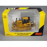 Norscot - A boxed 1:50 scale diecast Norscot #55224 Caterpillar D7E Track-Type Tractor with