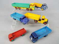 Dinky by Meccano - a collection of six unboxed diecast models trucks comprising Bedford truck and