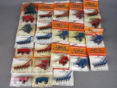 ERTL - approximately 48 diecast 1:64 scale model farm implements, wagons,