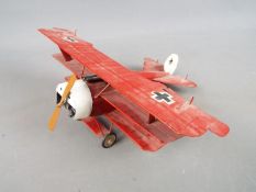 World War One (WW1) - a scratch built tin-plate model depicting the Fokker Dr-1 Red Baron tri-plane,