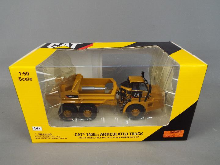 Norscot - A boxed 1:50 scale diecast Norscot #55500 Caterpillar 740B EJ Articulated Truck.