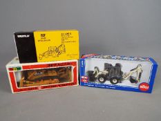 NZG, Siku, Diapet - Three boxed diecast construction vehicles in 1:50 scale.