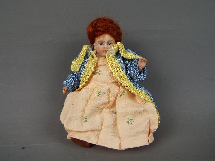 Armand Marseille - a bisque headed female doll with hand painted eyebrows eyelashes and lips with - Image 6 of 6