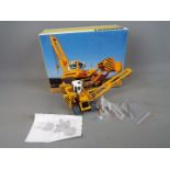 NZG - A boxed diecast 1:50 scale NZG #799 Liebherr RL 64 Litronic Pipelayer.