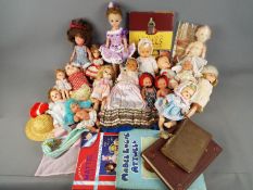 Dolls - a collection of in excess of twelve good quality mid century dolls with sleeping eyes,