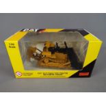 Norscot - A boxed 1:50 scale diecast Norscot #55212 Caterpillar D11T Track Type Tractor with Metal
