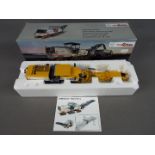 NZG - A boxed diecast 1:50 scale NZG #872/04 Wirtgen W250i Cold Milling Machine.