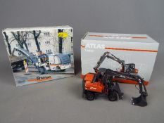 NZG, Wirtgen - Two boxed diecast construction vehicles in 1:50 scale.