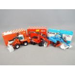 NZG - Three NZG boxed wheeled diecast construction vehicles in 1:50 scale.