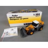 NZG - A boxed diecast 1:50 scale NZG #689/07 Liebherr L586 2plus2 Wheel Loader.