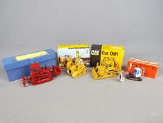 Conrad, NZG, Old Cars - Four boxed diecast construction vehicles in 1:50 scale.