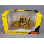 Norscot - A boxed 1:50 scale diecast Norscot #55165 Caterpllar 825H Soil Compactor.