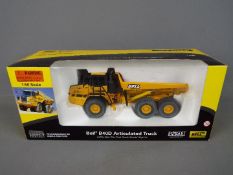 Norscot - A boxed 1:50 scale diecast Norscot #57502 Bell B40D Articulated Truck .