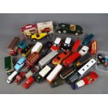 Burago, Saico and others - approximately 32 predominantly unboxed diecast model motor vehicles,