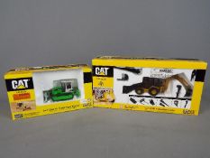 Norscot - Two boxed 1:50 scale diecast construction vehicles by Norsco .