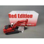 NZG - A boxed diecast 1:50 scale NZG #856/03 Red Edition Liebherr R936 Litronic Excavator.