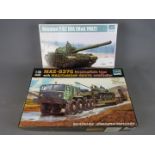 Two Trumpeter 1/35 scale boxed kits comprising MAZ-537G with MAZ/ChMZAP-5247G tractor and tank