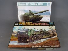 Two Trumpeter 1/35 scale boxed kits comprising MAZ-537G with MAZ/ChMZAP-5247G tractor and tank