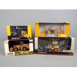 Ertl, Motorart - Four boxed diecast construction vehicles.