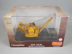 Norscot - A boxed 1:50 scale diecast Norscot #55210 Caterpillar 572C Track Type pipelayer.