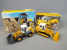 Conrad - Two boxed Liebherr diecast construction vehicles in 1:50 scale by Conrad.