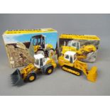 Conrad - Two boxed Liebherr diecast construction vehicles in 1:50 scale by Conrad.