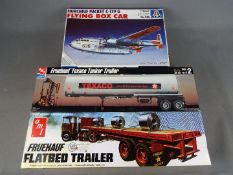 AMT, Italeri - Three boxed plastic model kits in various scales.