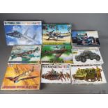 Tamiya, Hasegawa - 10 boxed plastic model kits in various scales.